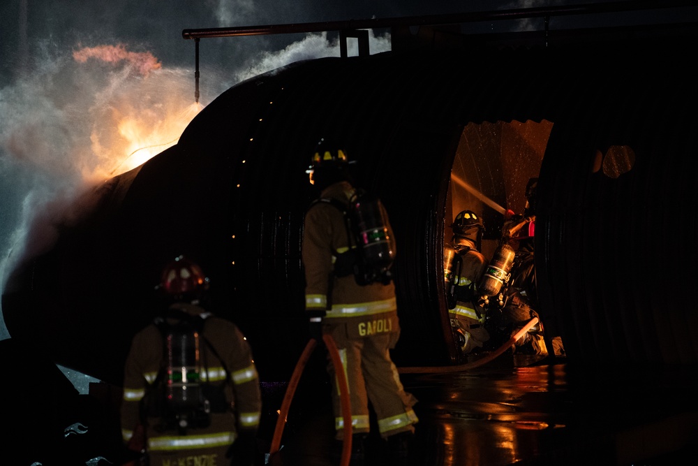 436th CES Fire Department conduct night live fire training