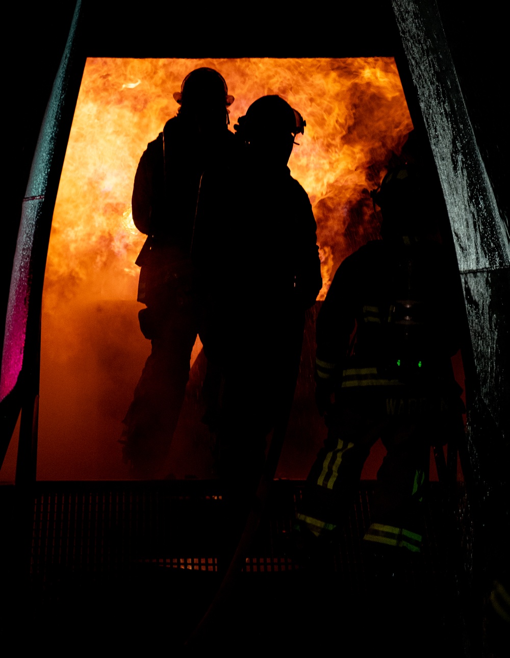 436th CES Fire Department conduct night live fire training