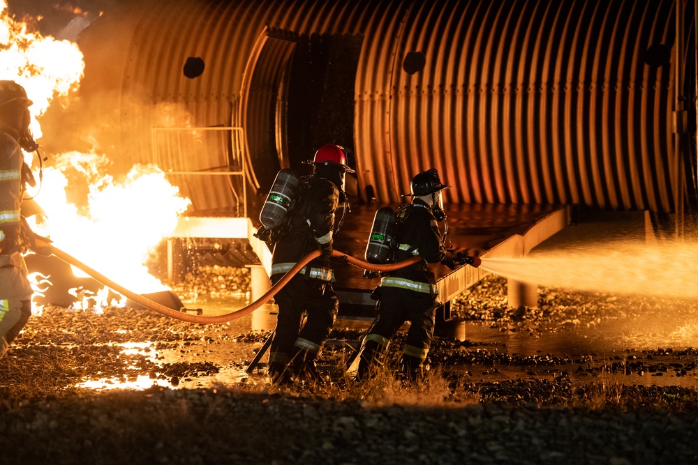 436th CES Fire Department conduct night live fire training
