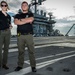 Naval Criminal Investigative Service (NCIS) Special Agents Afloat (SAA) Bernadette Duffy and Justin Botkin stand for an environmental portrait on the flight deck of the aircraft carrier USS Harry S. Truman (CVN 75)