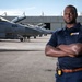 Environmental portrait of Naval Criminal Investigative Service (NCIS) Special Agent (SA) Kenneth Randle around the flight line with F-18 Hornets during the Naval Air Station (NAS) Oceana Airshow on 20 September 2024.