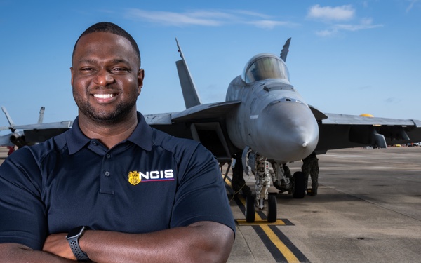 Naval Criminal Investigative Service (NCIS) Special Agent (SA) Kenneth Randle around the flight line with F-18 Hornets during the Naval Air Station (NAS) Oceana Airshow on 20 September 2024.