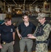 Naval Criminal Investigative Service (NCIS) Special Agents Afloat (SAA) Bernadette Duffy and Justin Botkin talk with Master-at-Arms First Class (MA!) Travis Beckman about an on-going investigation