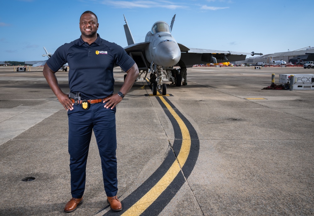 Naval Criminal Investigative Service (NCIS) Special Agent (SA) Kenneth Randle around the flight line with F-18 Hornets during the Naval Air Station (NAS) Oceana Airshow on 20 September 2024.