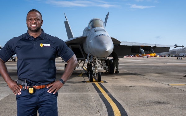 Naval Criminal Investigative Service (NCIS) Special Agent (SA) Kenneth Randle around the flight line with F-18 Hornets during the Naval Air Station (NAS) Oceana Airshow on 20 September 2024.