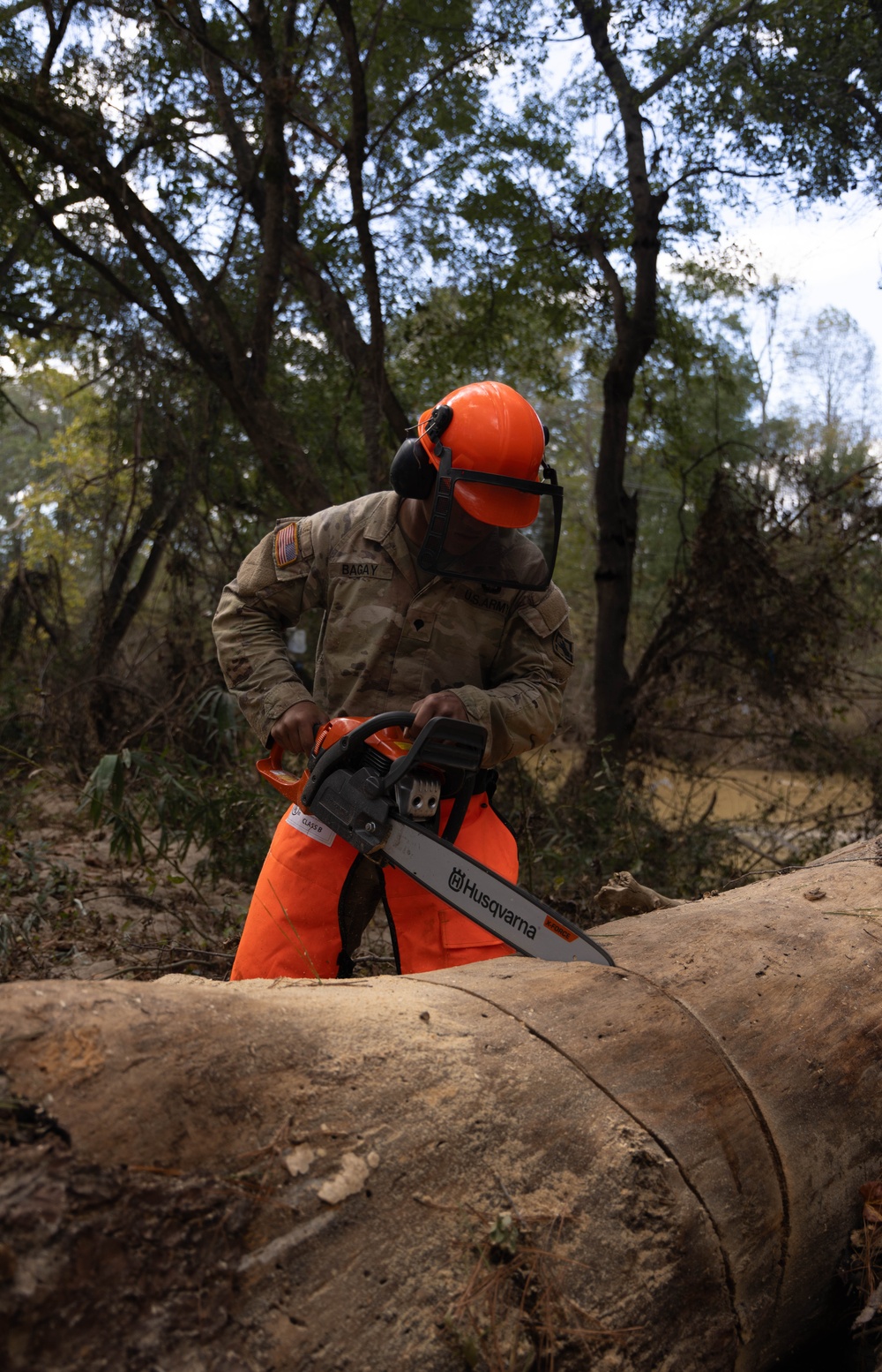 27th Engineer Battalion saws through debris while conducting route clearance