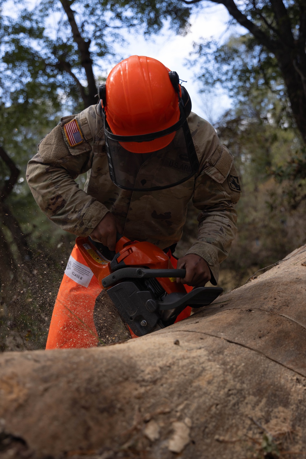 27th Engineer Battalion saws through debris while conducting route clearance