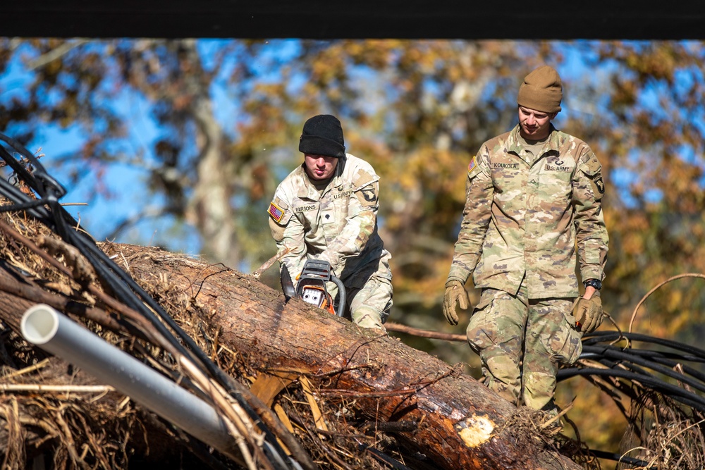 887th Engineer Company 19th Engineer Battalion, cut through pieces of debris