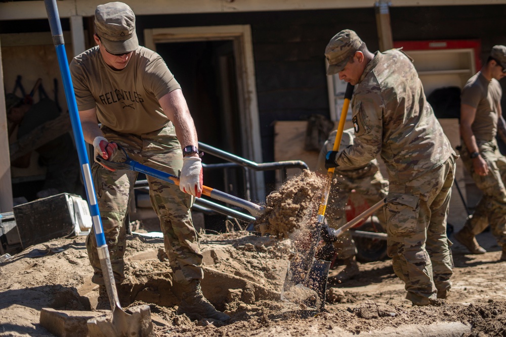 U.S. Army Soldiers assigned to Hardrock Company, 1-502 Infantry Regiment, 2nd Mobile Brigade Combat Team, 101st Airborne Division (Airborne), conduct route clearance Chimney Rock, North Carolina, Oct. 17, 2024.