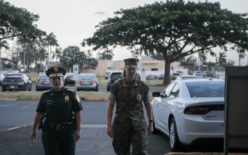 HPD and PMO Work Together: HPD and MCBH PMO work together to enforce traffic violations on the H-3