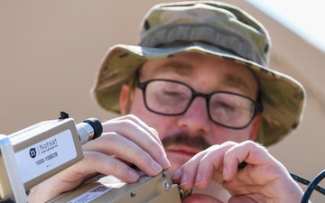 378th ECS Airmen Practice Assembling a Communications Fly-away Kit