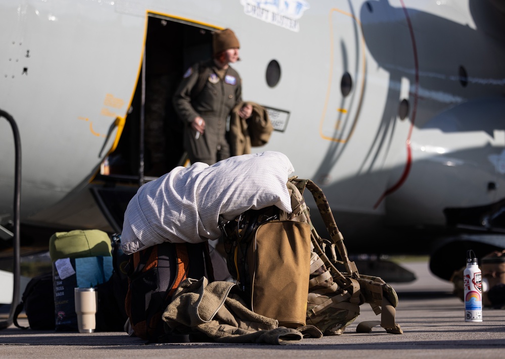 Airmen from the 109th Airlift Wing prepare to depart for the beginning of Operation Deep Freeze