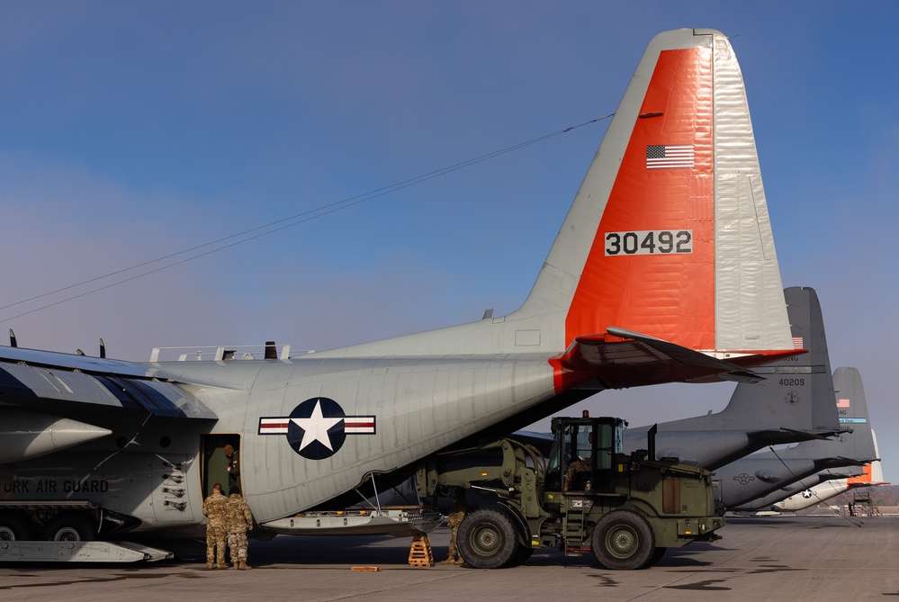 Airmen from the 109th Airlift Wing prepare to depart for the beginning of Operation Deep Freeze