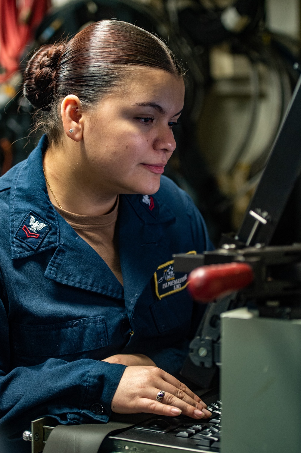 Nimitz Sailor Tests Calibration of Hold-Back Bar