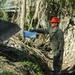 Tennessee Army National Guardsmen clear debris on Denton Road in Cocke County, Tennessee