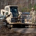 161st Engineer Support Company (Airborne) removes debris during route clearance near Green Creek in Bakersville, North Carolina