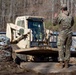 161st Engineer Support Company (Airborne) removes debris during route clearance near Green Creek in Bakersville, North Carolina