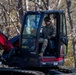 161st Engineer Support Company (Airborne) removes debris during route clearance near Green Creek in Bakersville, North Carolina