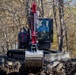 161st Engineer Support Company (Airborne) removes debris during route clearance near Green Creek in Bakersville, North Carolina