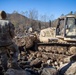 161st Engineer Support Company (Airborne) removes debris during route clearance near Green Creek in Bakersville, North Carolina