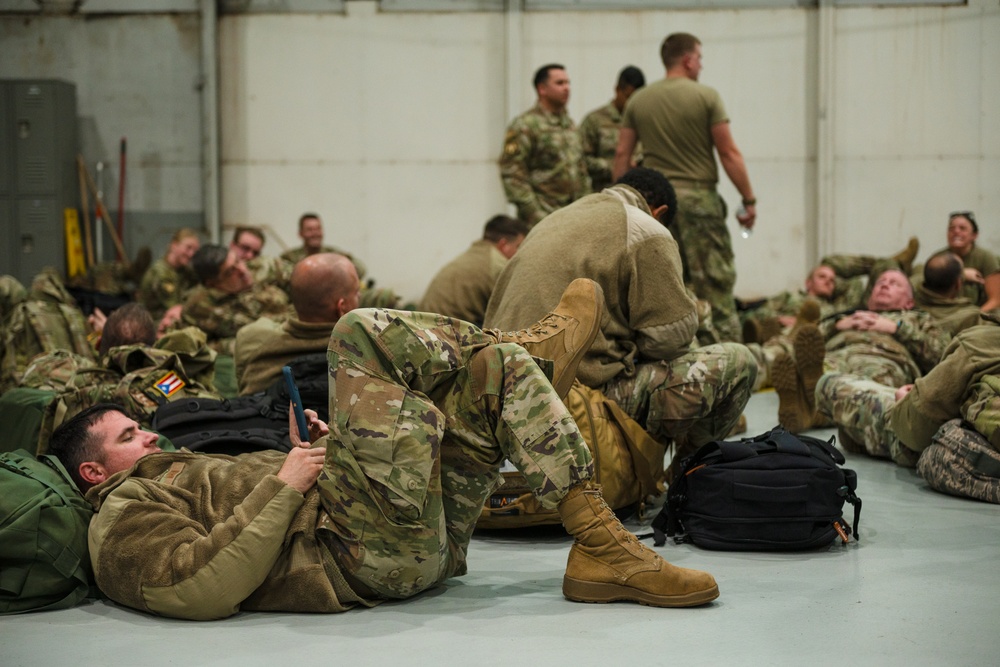 169th Fighter Wing Mock Deployment Bag Drag in hanger