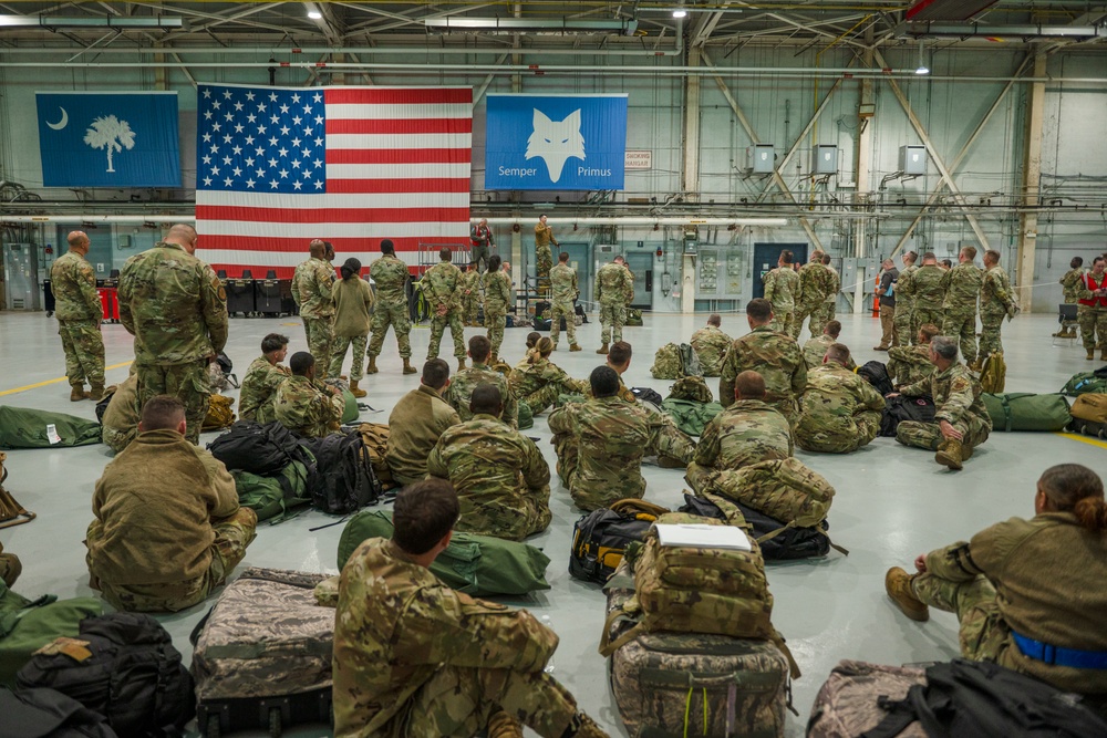 169th Fighter Wing Mock Deployment Bag Drag in hanger