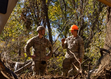 U.S. Army Soldiers assigned to 161st Engineer Support Company (Airborne), 27th Engineer Battalion (Airborne), 20th Engineer Brigade, XVIII Airborne Corps conduct route clearance in Swannanoa, North Carolina, Oct. 18th, 2024.