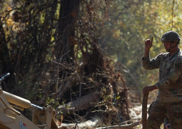 U.S. Army Specialist Corbin Park assigned to 161st Engineer Support Company (Airborne), 27th Engineer Battalion (Airborne), 20th Engineer Brigade, XVIII Airborne Corps conduct route clearance in Swannanoa, North Carolina