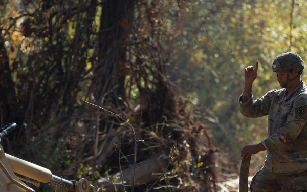 U.S. Army Specialist Corbin Park assigned to 161st Engineer Support Company (Airborne), 27th Engineer Battalion (Airborne), 20th Engineer Brigade, XVIII Airborne Corps conduct route clearance in Swannanoa, North Carolina
