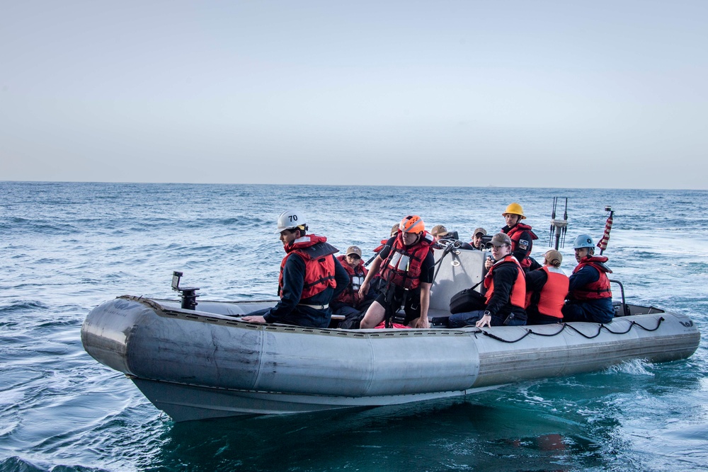 Sailors assigned to Nimitz-class aircraft carrier USS Carl Vinson (CVN 70) conduct small boat operations