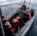 Sailors assigned to Nimitz-class aircraft carrier USS Carl Vinson (CVN 70) board a rigid-hull inflatable boat