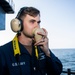 A Boatswain’s Mate 3rd Class stands buoy watch on the fantail