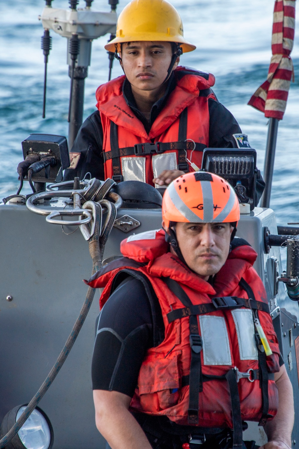 Sailors assigned to Nimitz-class aircraft carrier USS Carl Vinson (CVN 70) navigate a rigid-hull inflatable boat