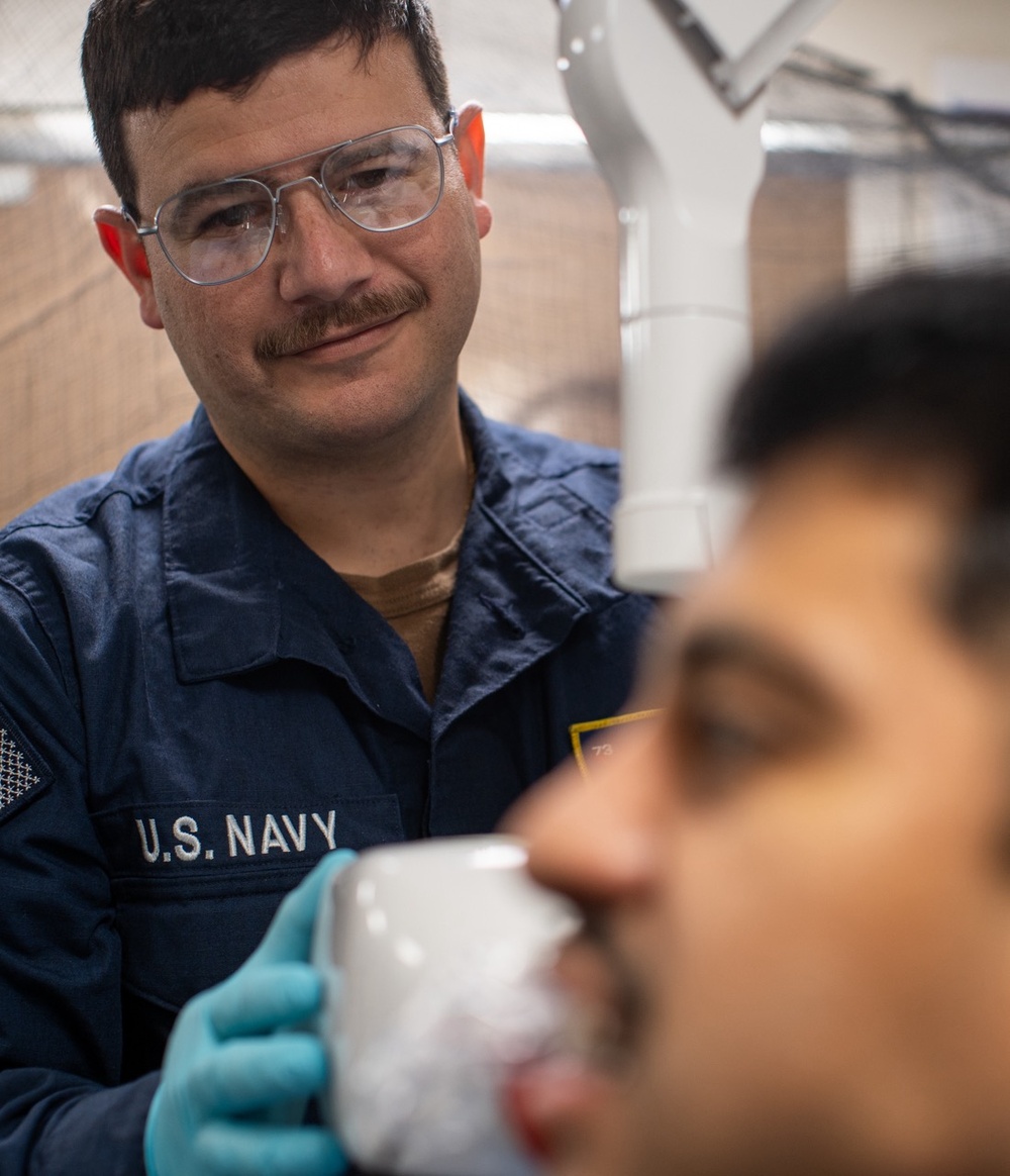 USS George Washington dental department perform daily operations