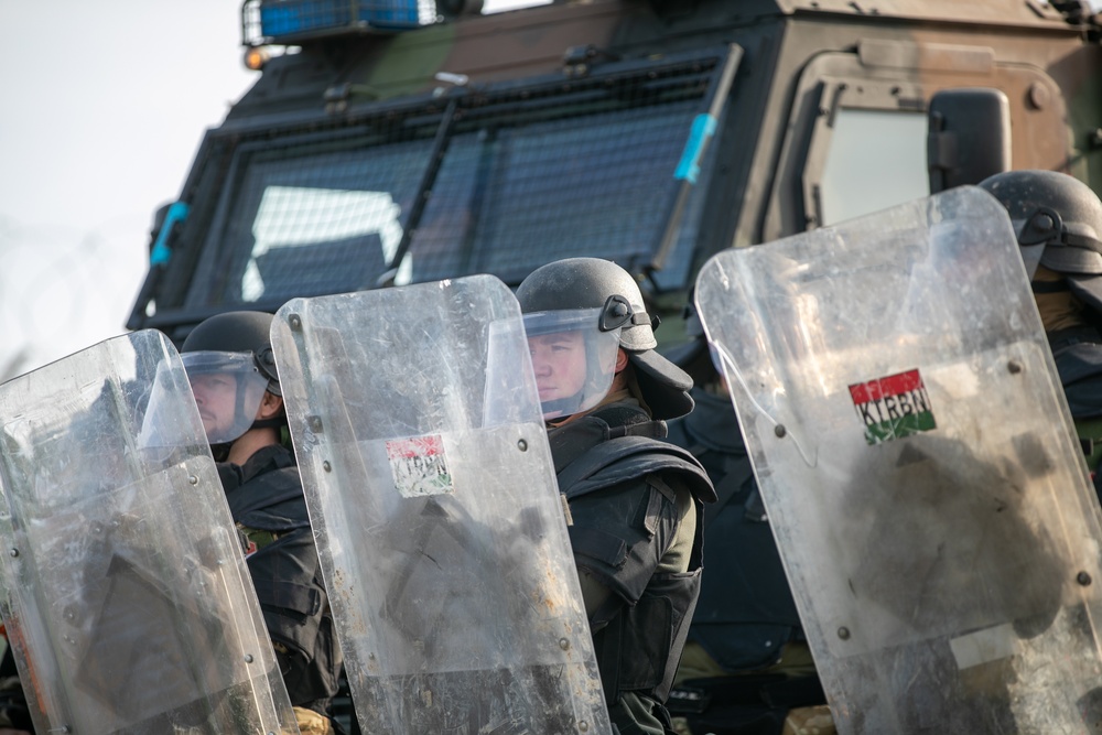 Multinational soldiers, assigned to NATO-led KFOR mission conduct FOM-D and CRC training