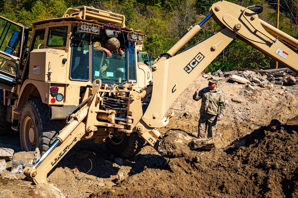 North Carolina National Guard and U.S. Army Joint Forces to Clear Debris, Prevent Flooding in Marshall N.C.