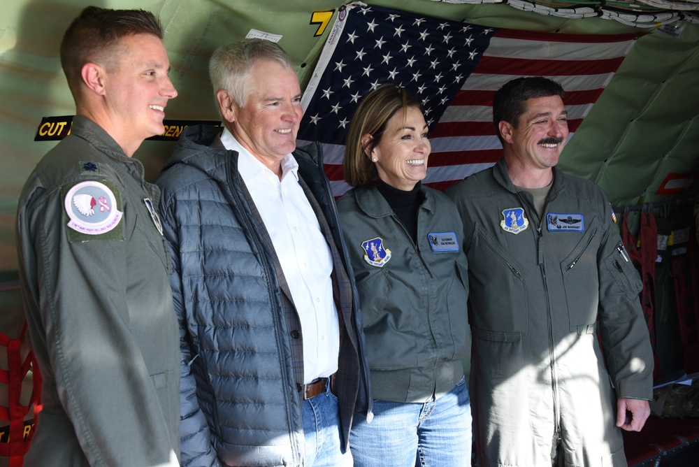 Gov. Reynolds and husband pose for photo with pilots