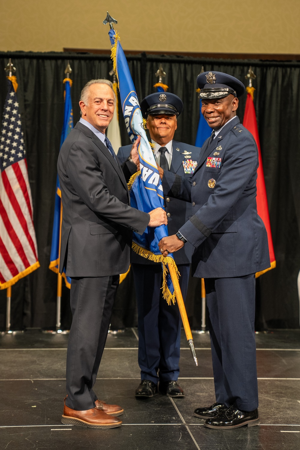 Berry passes guidon to Gov. Lombardo