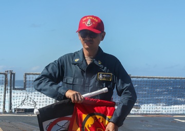 Sailors aboard the USS Howard conduct a crash and salvage drill in the South China Sea