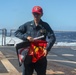 Sailors aboard the USS Howard conduct a crash and salvage drill in the South China Sea