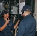 Sailors aboard the USS Howard conduct a replenishment-at-sea with the USNS Rappahannock in the South China Sea