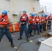 Sailors aboard the USS Howard conduct a replenishment-at-sea with the USNS Rappahannock in the South China Sea