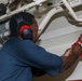 Sailors aboard the USS Howard conduct routine maintenance in the South China Sea