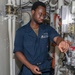 Sailors aboard the USS Howard conduct routine maintenance in the South China Sea