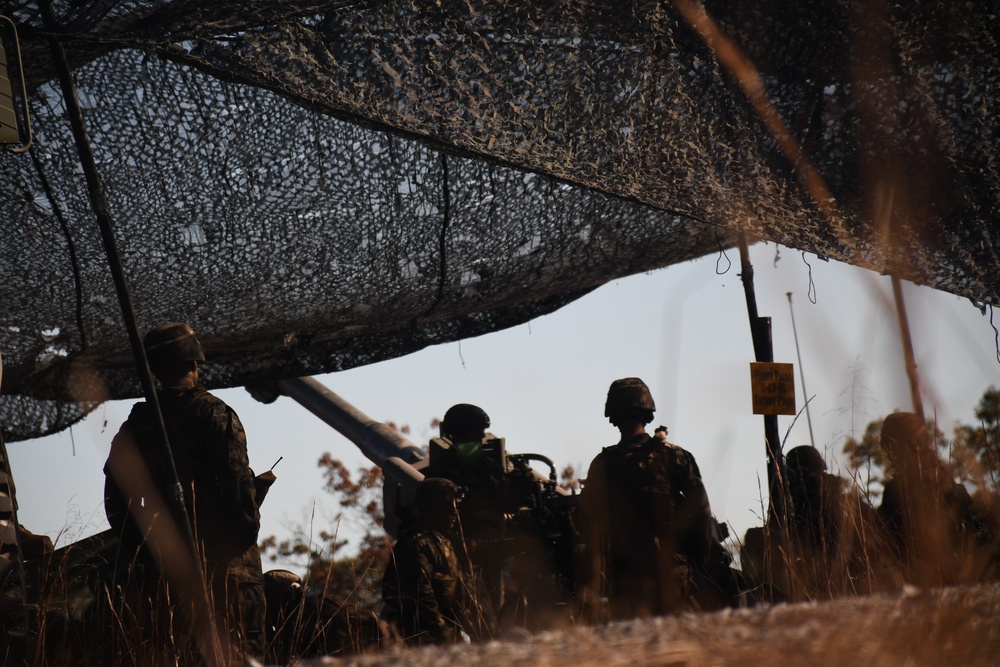 U.S. Marine Reservists Fire a M777 Howitzer
