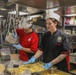 Sailors aboard the USS Howard prepare lunch for the crew in the South China Sea