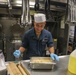 Sailors aboard the USS Howard prepare lunch for the crew in the South China Sea