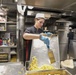 Sailors aboard the USS Howard prepare lunch for the crew in the South China Sea