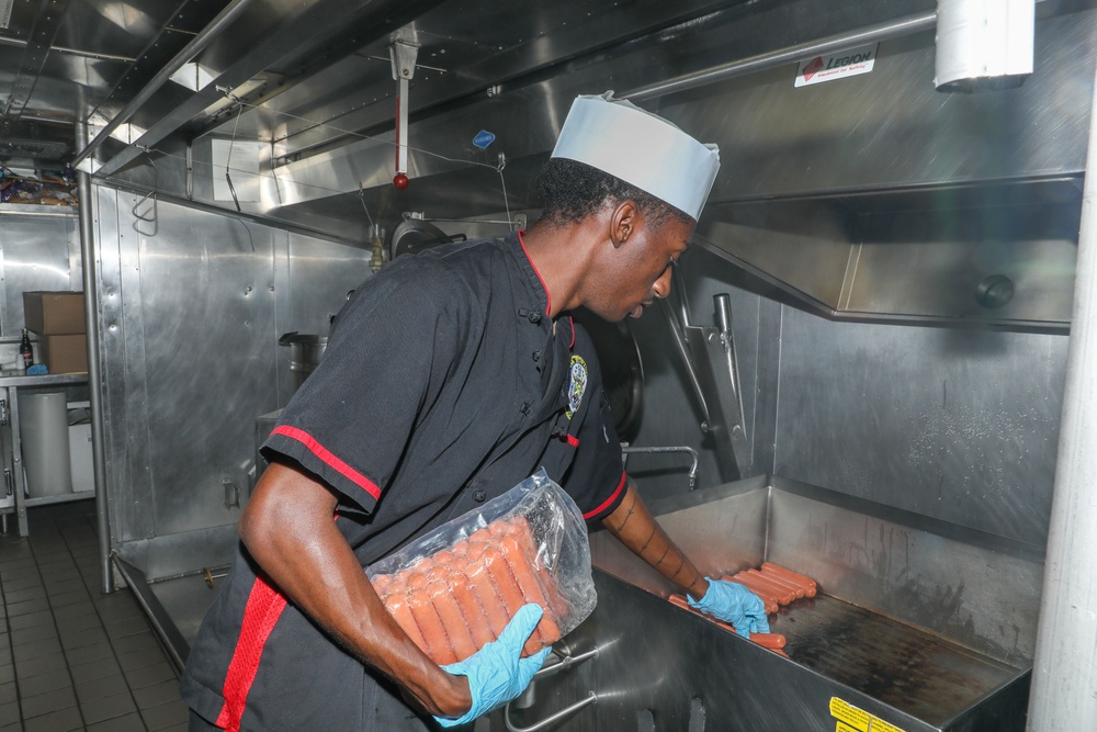 Sailors aboard the USS Howard prepare lunch for the crew in the South China Sea