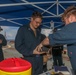 Sailors aboard the USS Howard conduct a small arms gunshoot in the South China Sea